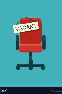 Composition with office chair and a sign vacant